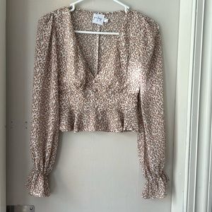 Polly longsleeve V-neck cropped blouse. Size0. Buttons on front, zipper on side.